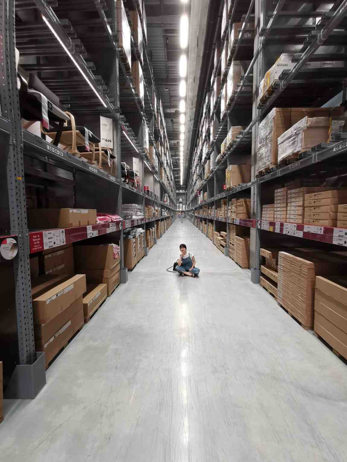 a warehouse as the place where raw materials and finished goods are stored